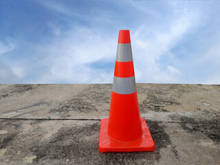 orange traffic cone on the road