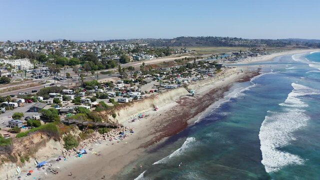 Aerial shot over Cardiff By The Sea beach and city in California, America