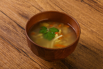 Tasty chicken soup with carrot