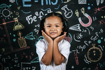 Portrait lovely girl front of education blackboard in background