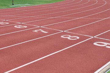 Close up of lane 7 and 8 of a university athletic running track