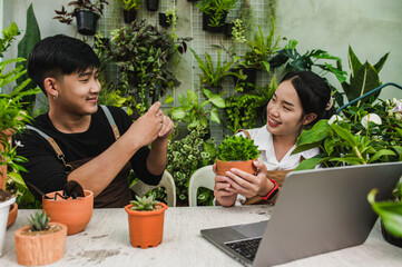 Young gardener man use smartphone take a photo his girlfriend