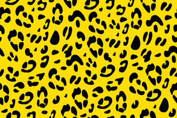 Yellow leopard seamless pattern. Animalistic print. Vector hand-drawn background