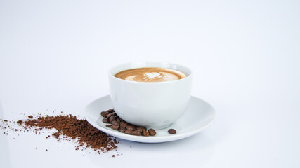 White Cup of Mocha Latte Coffee with Leaf Artwork made by Barista on porcelain plate with coffee seeds and powder on white background. Render Graphic for Cafe Store and Restaurant.