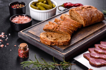 Delicious fresh bacon sliced with bread and vegetables