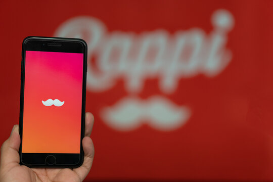 Rappi logo on the phone with the logo at the bottom, Rappi App.