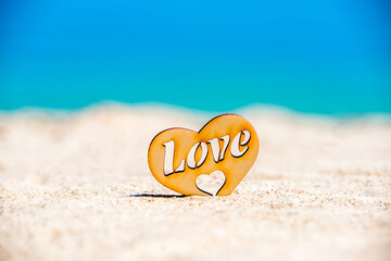 romantic symbol of heart on the beach
