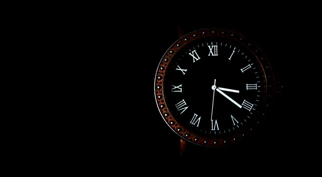 Men's watches on a black background close-up with a place for the inscription