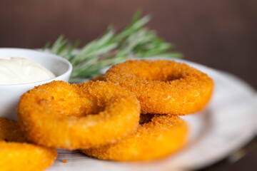 cheese rings with cheese sauce with spices