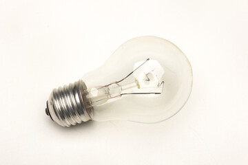 Clear glass incandescent filament bulb, analog technology