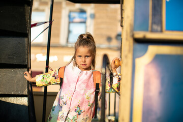 little child playing on playground