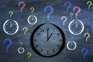 Creative clock and question marks sketch on chalkboard wall background. Time management and...