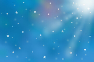 雪が降るキラキラ輝く星と光の背景