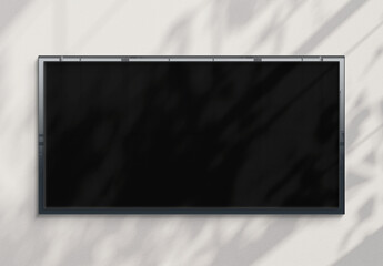 Panoramic billboard hanging on a sunlit wall mockup. Template of a pano frame bathed in sunlight 3D rendering