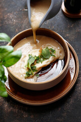 Mushroom cream soup with dumplings. A warming soup.
A tasty dish.Culinary photography. Suggestion to serve the dish.