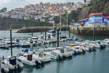Fototapeta na wymiar boats in the harbor of Lastres, Asturias 