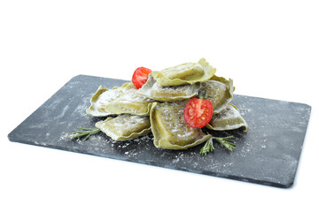 Tray with raw ravioli isolated on white background