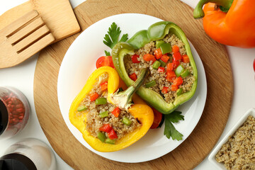 Concept of tasty food with stuffed pepper on white background