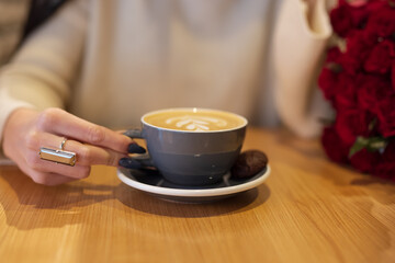 Girl hand take a coffee