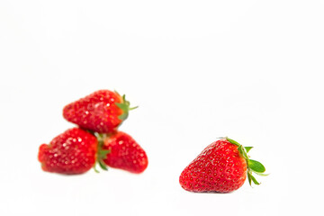 freshly picked organic strawberry isolated over white background, healthy eating. 