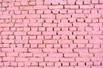 Brick wall as a background, texture of a finishing brick loft style for an interior with copy space. Pink brick wall texture.