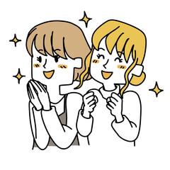 上を見て喜んでいる二人の女性