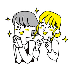 上を見て喜んでいる二人の女性