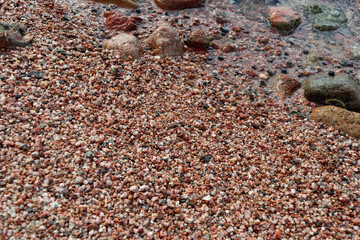Red Sand and Stones of the red Sea Coast, Natural Texture Background