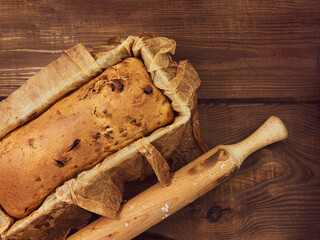 Baking cake with rolling pin on rural rustic wooden background flat lay. Dough recipe ingredients...