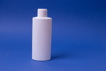 packaging of face or hand cream on colored background