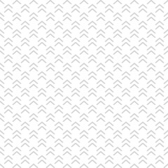 Seamless pattern with grey strokes, arrows on white background. Ethnic symmetric background