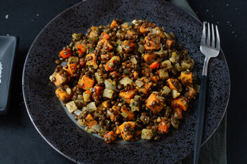 Cooked black lentil with pumpkin