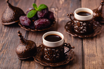 Turkish coffee and dried dates fruit.