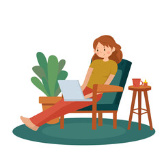 A girl with a laptop. The girl in the chair. Work at home. Stay at home. Remote work