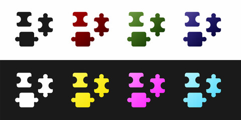 Naklejka premium Set Puzzle pieces toy icon isolated on black and white background. Vector