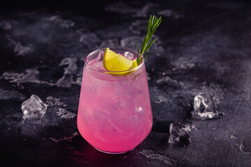Refreshing pink drink or cocktail with ice