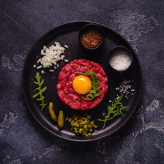 fresh beef tartar with tasty vegetables
