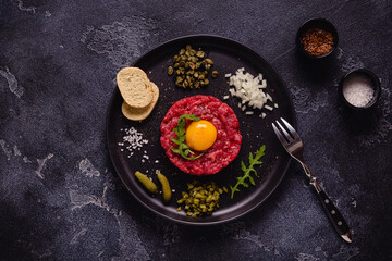 fresh beef tartar with tasty vegetables