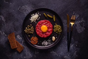 fresh beef tartar with tasty vegetables