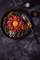 fresh beef tartar with tasty vegetables