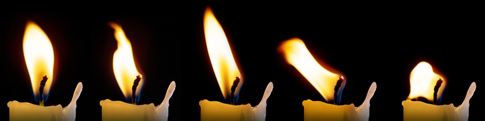 A set of candle flames isolated on a black background, a collection of five images to overlay on...