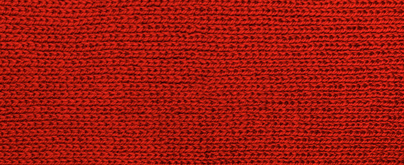 The texture of woolen fabric with lint. The pattern is visible.