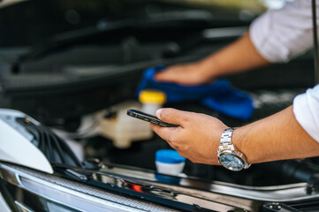 A man calls to repair a car.