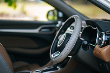 Fototapeta na wymiar steering wheel in the car