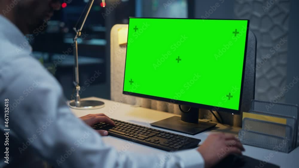 Aufkleber Close Up of a Businessman Working on Desktop Computer with Chroma Key Green Screen Mock Up Display. Male Executive Director Managing Digital Projects, Typing Data, Using Keyboard and Mouse.