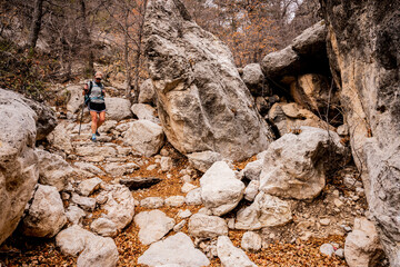Female Hiker Traversing a Section of Stone Stairs In Guadalupe Mountains