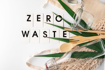 Zero waste, plastic-free and eco-friendly lifestyle. Cotton mesh bag, glass bottle, jar and bamboo...