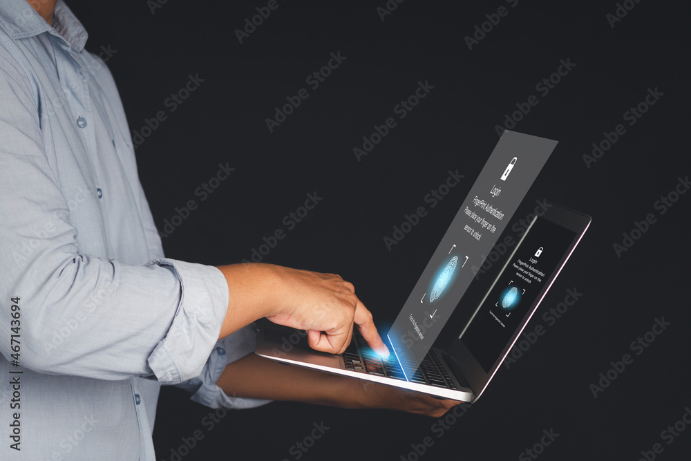 Poster the login page by fingerprint on the virtual screen to the computer system on the laptop. business, 