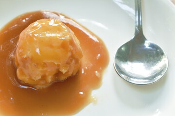 mashed potato dressing gravy sauce and silver spoon on plate