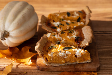Pumpkin tart with feta cheese and herbs